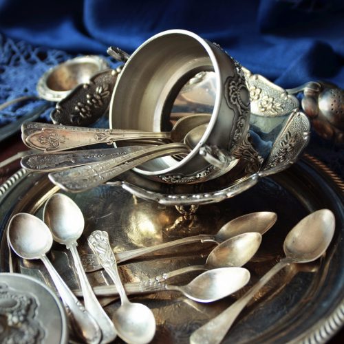Vintage silverware on the old wooden table